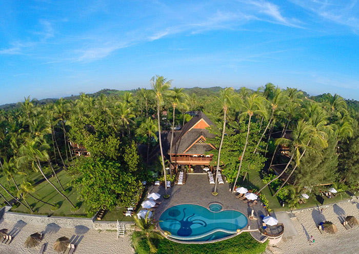 Beachfront swimming pool at Amazing Ngapali Resort facing the turquoise Bay of Bengal